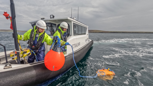 Acoustic monitoring kit being deployed into the water (Credit Colin Keldie - EMEC)
